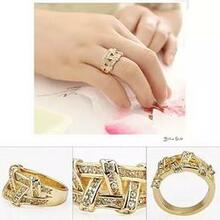 Nysa The Swarovski Crystal Cocktail Ring In Gold And Rose Gold